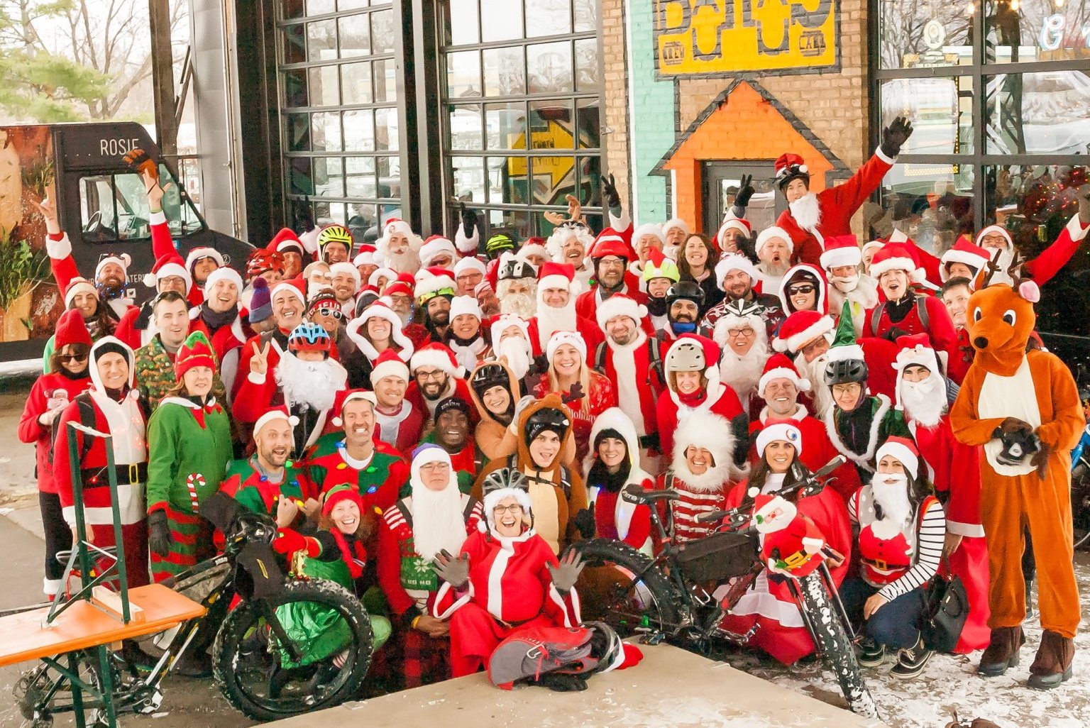 A large modern group of Santa Cycle Rampage riders