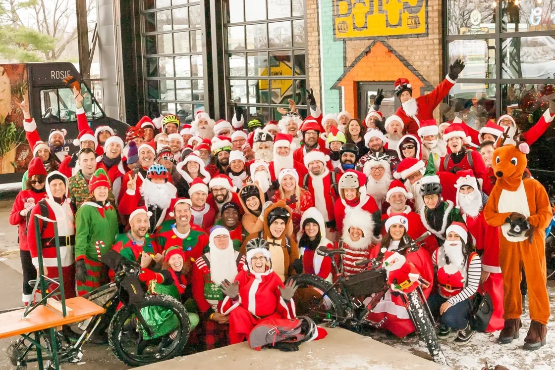 A large modern group of Santa Cycle Rampage riders